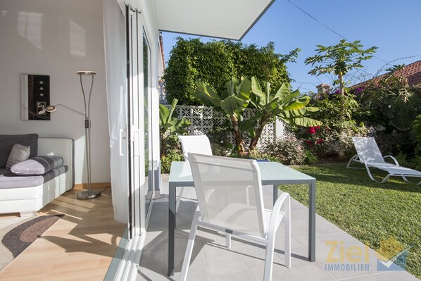 Sunny terrace by living room