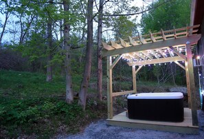 Our new private 6-person hot tub next to the private fire pit! 