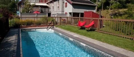 The 30' lap pool is right outside your door.