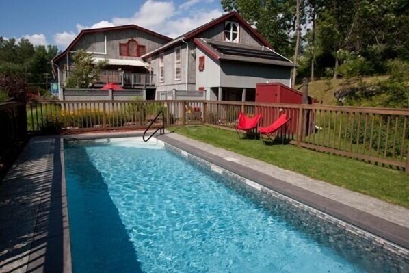 The 30' lap pool is right outside your door.