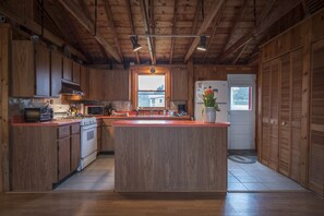 Kitchen off the main living room and dining area.