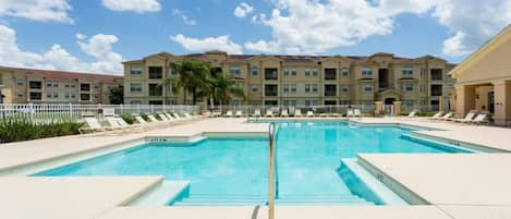 Your condo (ground floor, left) overlooking the swimming pool