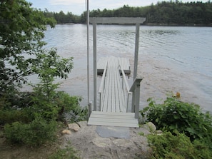 Runway and dock are close to cottage.