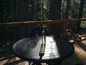 Enjoy a glass of wine on the spacious wrap around deck. 