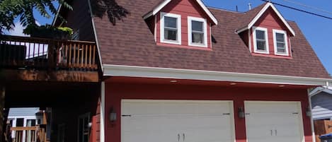 Unit is located above garage. Separate stairway (left) to enter apartment.