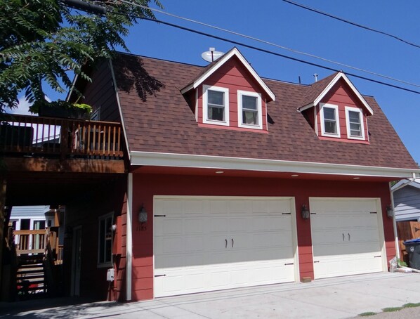 Unit is located above garage. Separate stairway (left) to enter apartment.