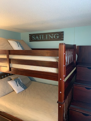 Queen bunks in second bedroom with stairs for easy climbing and storage! 