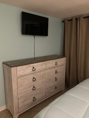 Master Bdrm: Lots of storage and USB ports on the back of matching nightstand. 