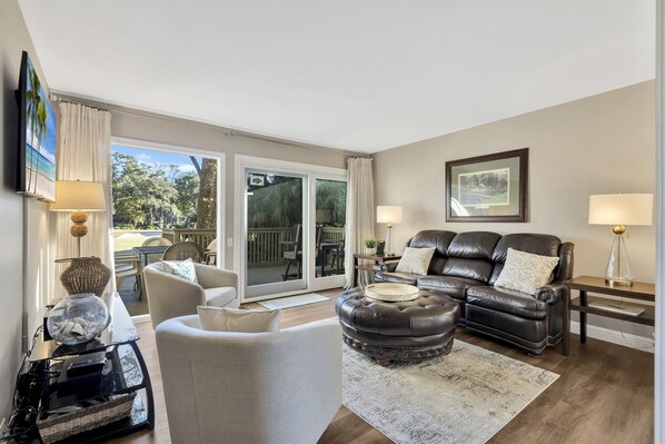 Spacious liviing room with views of Robert Trent Jones 18th hole