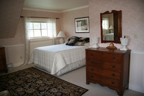 The upstairs Master Bedroom is light and airy