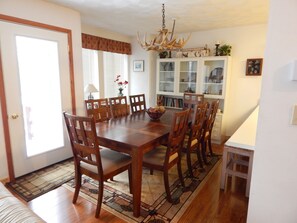 New dining room table in 2013, seats 8 comfortably.
New flooring put in 2014