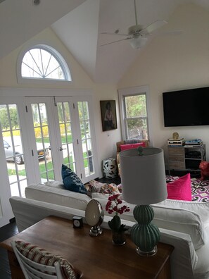 LIVING ROOM WITH CATHEDRAL CEILINGS - FLOODED WITH LIGHT