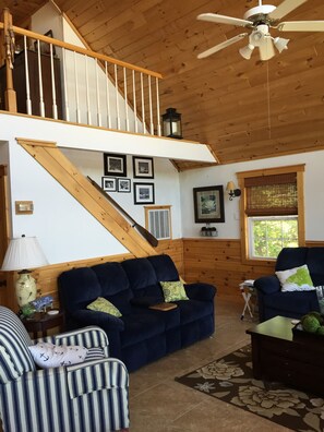 Living Room, stairs to loft, open concept living