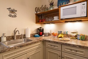 Kitchenette - sink, microwave, Keurig, refrigerator, toaster, electric fry pan