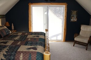 King Room from the doorway looking to upper level balcony door.