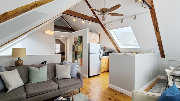 Open main living area with vaulted ceiling