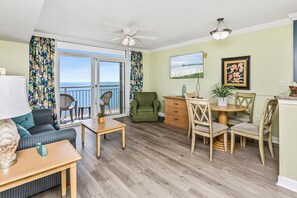 Spacious oceanfront living room with a 55-inch smart TV