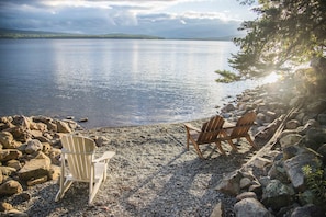 Common lakefront area for swimming, relaxing and launching small water craft