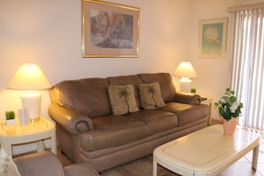 Leather love seat and sofa in the living room