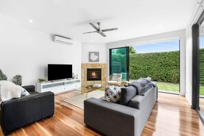 A cosy gas log fire in the main living area