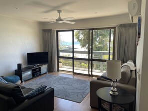 Lounge room with view to the beach.