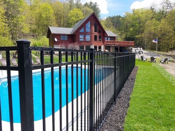 Gorgeous log home with many amenities. Weather permitting, pool opens 5/24.
