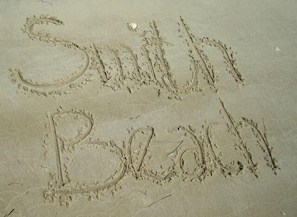 Dig your toes I to the soft sand of Smith Beach.