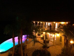 Infinity pool night view from second master terrace