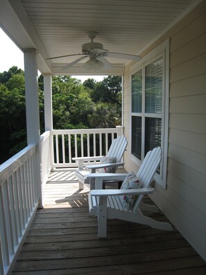 two porches with tables,chairs and relaxation!