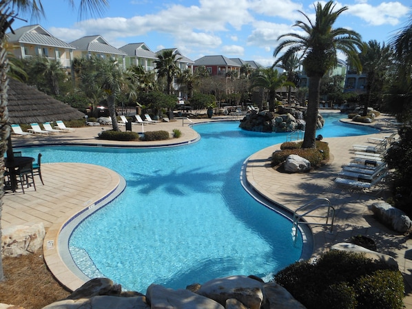 The 30,000 sqft resort style pool features a zero-entry kids area and waterfall!