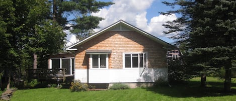 View of the end of the house as you come down the driveway.