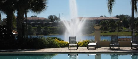 A taste of Paradise! Resort pool with lake behind