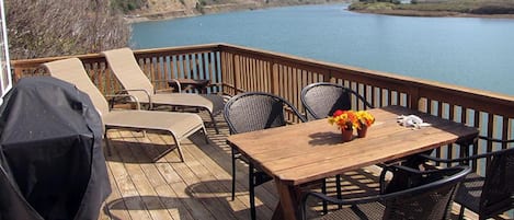 Upper River Deck table, chaise, gas grill