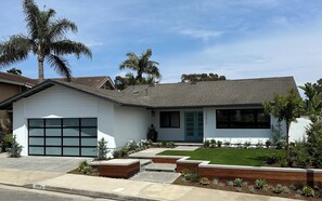 Single story home on quiet street one mile from the beach.