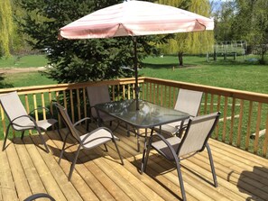 Enjoy 4 acres of park-like setting from the deck