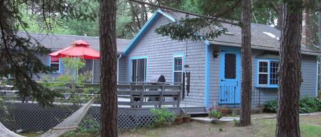 Cottage with guest wing and den addition