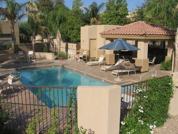 Beautiful pool and Hot tub, with two gas grills