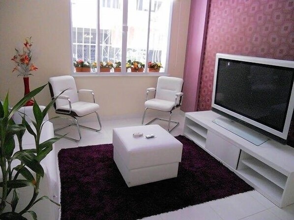 Living room with 52 in Plasma TV