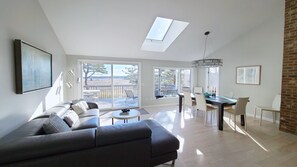 Main living area is open and bright with wonderful tidal marsh views