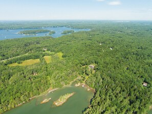 Aerial view - island in front of house on private cove
