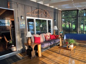 Screened-in porch is loved by all.