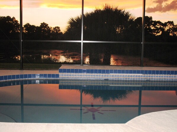 Sunset over the swimming pool & lake