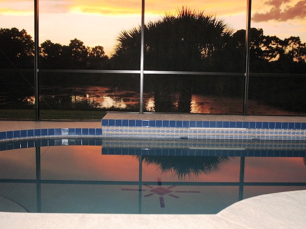 Sunset over the swimming pool & lake