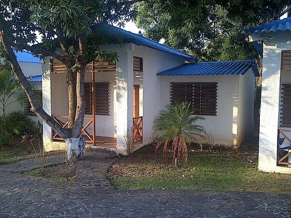 standalone house , 10 villas per each side of the cobblestone walkway