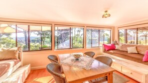 Sunroom with 2 day beds and 2 trundle beds