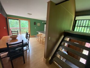 View of dining/kitchen area from entrance landing.