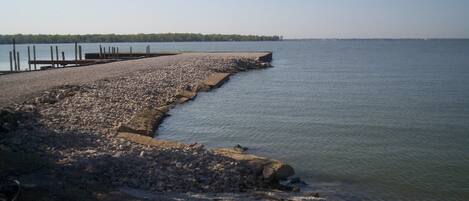 Fishing jetty and shoreline view directly from the cottage.