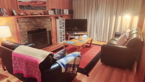 Leather Lounges, Woollen Rugs, Smart TV and an Open Fire in Winter. 