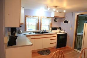 Fully Equipped Kitchen. Pots, pans, utensils, glassware, blender, coffee pot