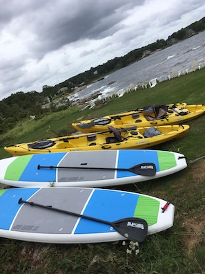 FREE TOP OF THE LINE PADDLEBOARDS AND KAYAKS FOR YOUR USE .FISHING POLES TOO